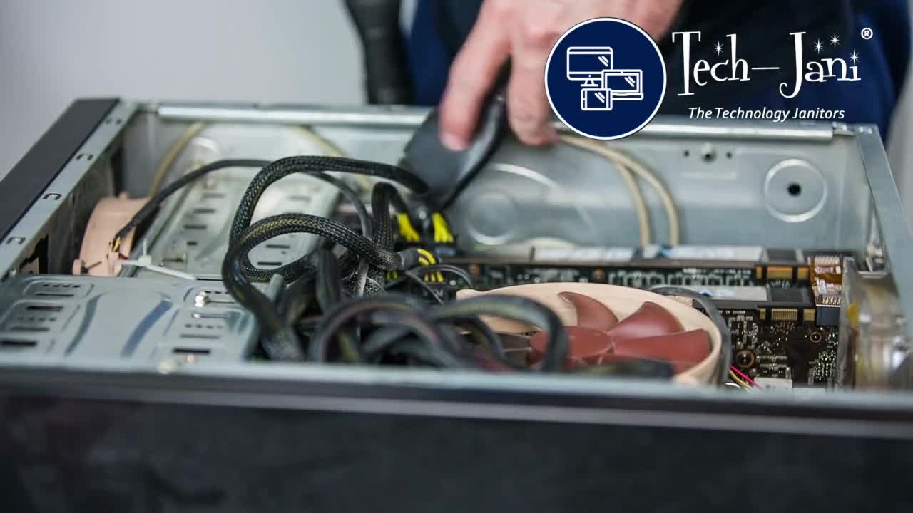 Close-up from the Tech-Jani video showing cleaning inside a desktop computer